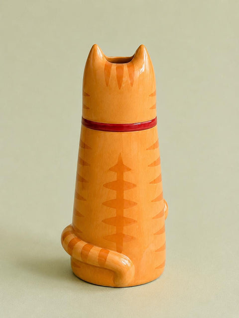 Ginger Cat Bud Vase with a Red Bell Collar close-up