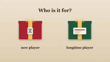 Two gift boxes, one with a tile for a new player and one with a line reader card for a longtime player