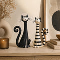 Black and Striped Long-Neck Cat Pair, Clay Figurines, styled in a home setting