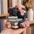 Black Cat Sleeping on Books Figurine, Floral Crown, styled in a home setting (view 2)
