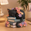 Black Cat Sleeping on Books Figurine, Floral Crown, styled in a home setting (view 5)