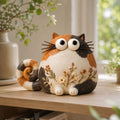 Calico Cat Figurine with Wildflower Belly, styled in a home setting