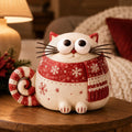 Christmas Cat Figurine in a Red Snowflake Scarf, styled in a home setting (view 2)