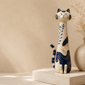 Cobalt Blue and Gold Chinoiserie Cat Figurine, on a plain background