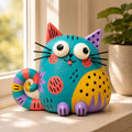 Colorful Teal Chubby Cat Figurine, Folk Art Clay, styled in a home setting (view 2)