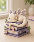 Sleeping Pastel Dragon on Lavender Books Figurine, styled in a home setting (view 2)
