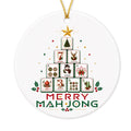 Round white ceramic ornament with mahjong tiles stacked into a Christmas tree and the words Merry Mahjong