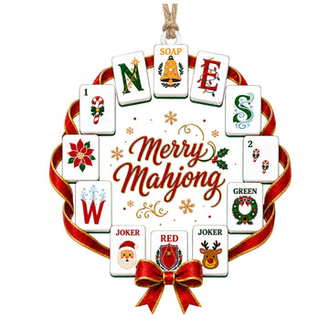 Large wreath-shaped acrylic ornament with mahjong wind tiles, Santa and reindeer jokers and a red bow around the words Merry Mahjong