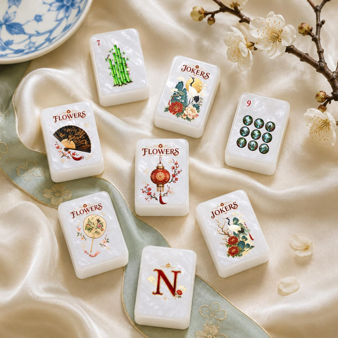 Oriental Crane and Dragon American Mahjong Set, 152 Pearl Tiles, tiles with cranes, peonies and a red dragon on a desk with brushes