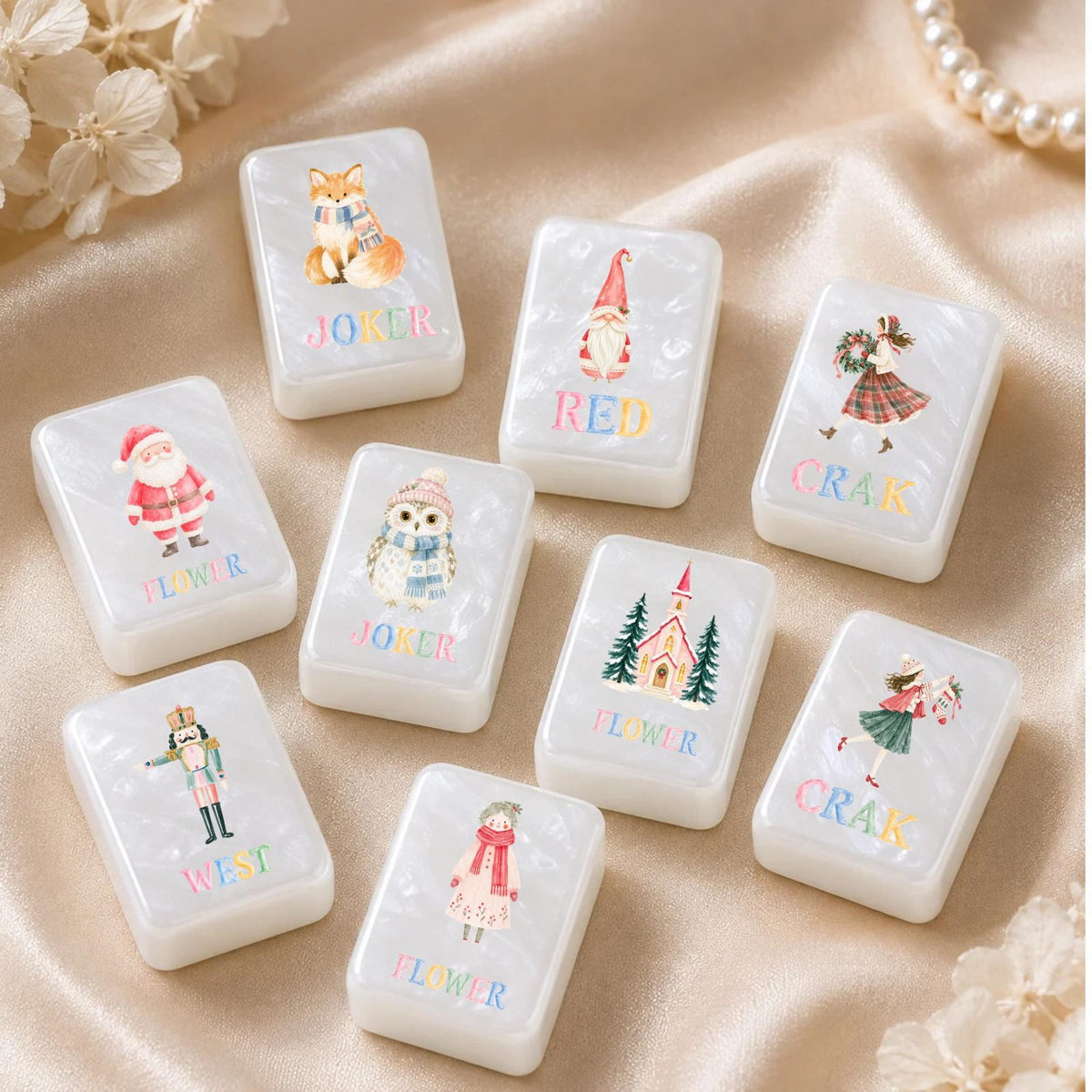Pastel Nutcracker Christmas American Mahjong Set, 152 Pearl Tiles, tiles with Santa, a fox, an owl and a church on cream satin