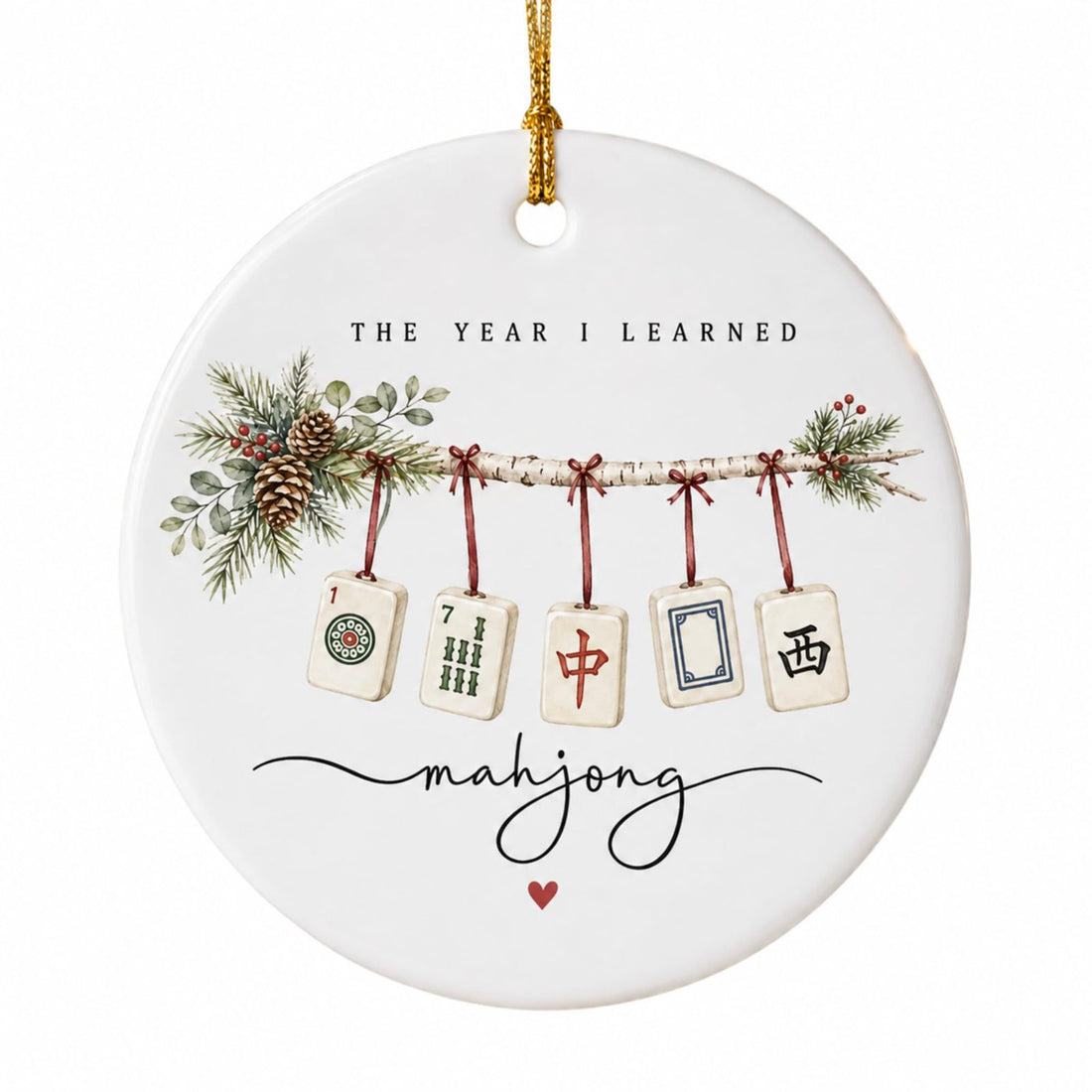 Round white ceramic ornament with five mahjong tiles on a pine garland and the words The Year I Learned mahjong