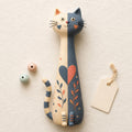 Split-Color Long-Neck Cat with Heart and Leaves, flat lay